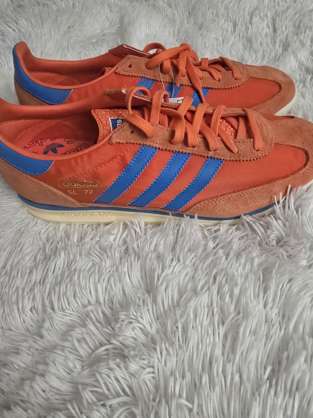 adidas Orange Sneakers with Blue Stripes